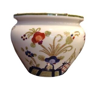 Porcelain vase 4.5” tall x 5” wide. Floral. Red blue green white.